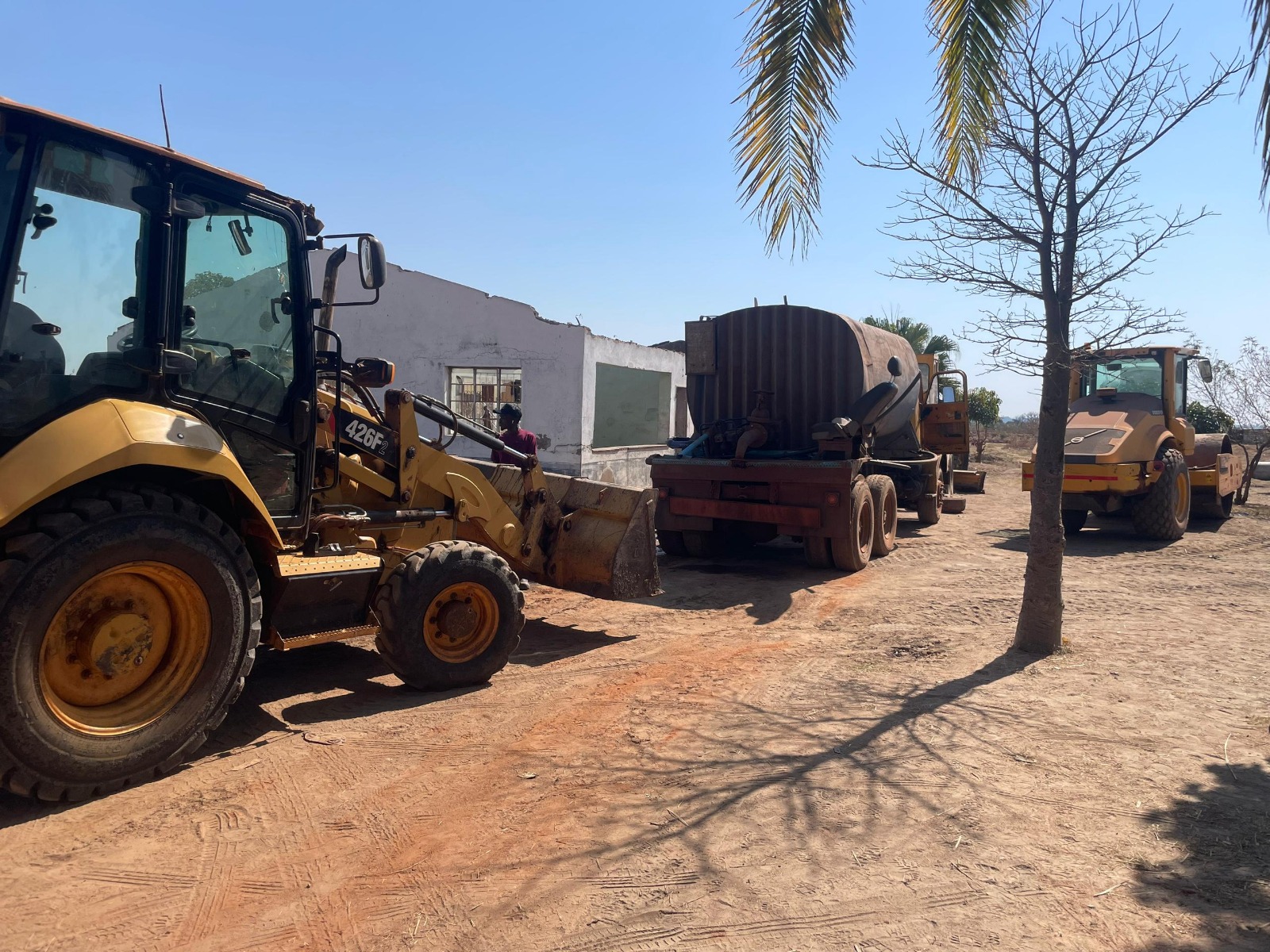 Fleet — backhoe, tanker, roller